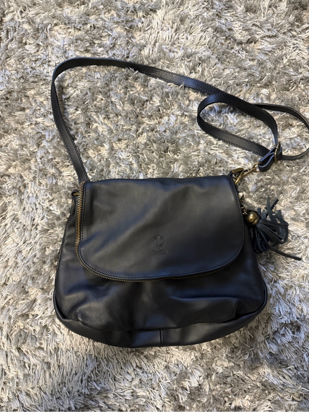 Vera Pelle Black Leather Crossbody with Tassel Accent